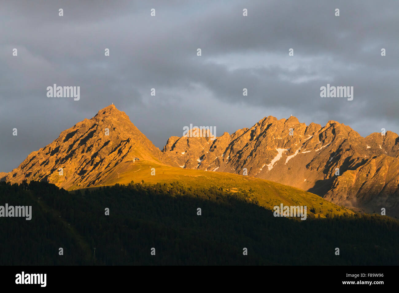 Colorful Alpenglow in the mountains near Nauders, Austria Stock Photo