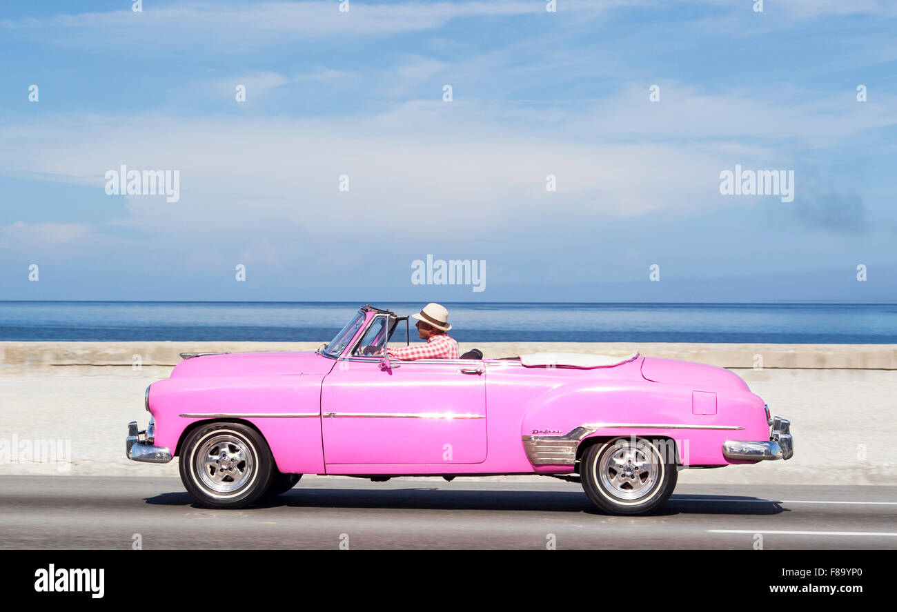 HAVANA,CUBA - NOVEMBER 9, 2015 : Vintage American car at the Malecon avenue Stock Photo