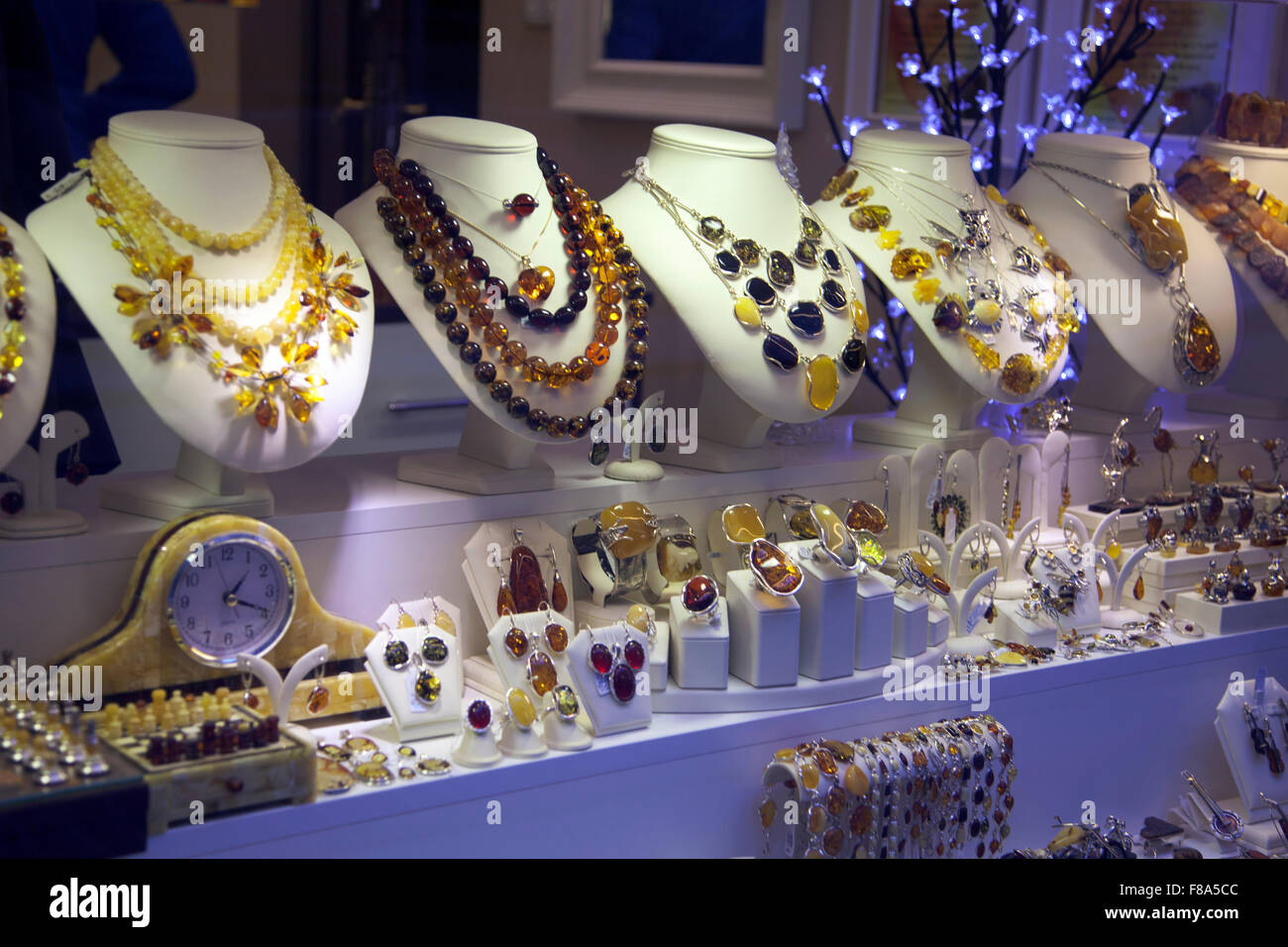 Shop display with amber jewelry and decorations in the Old Town of Warsaw, Poland Stock Photo