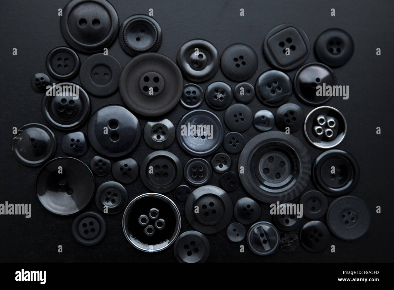 Selection of elegant black buttons Stock Photo