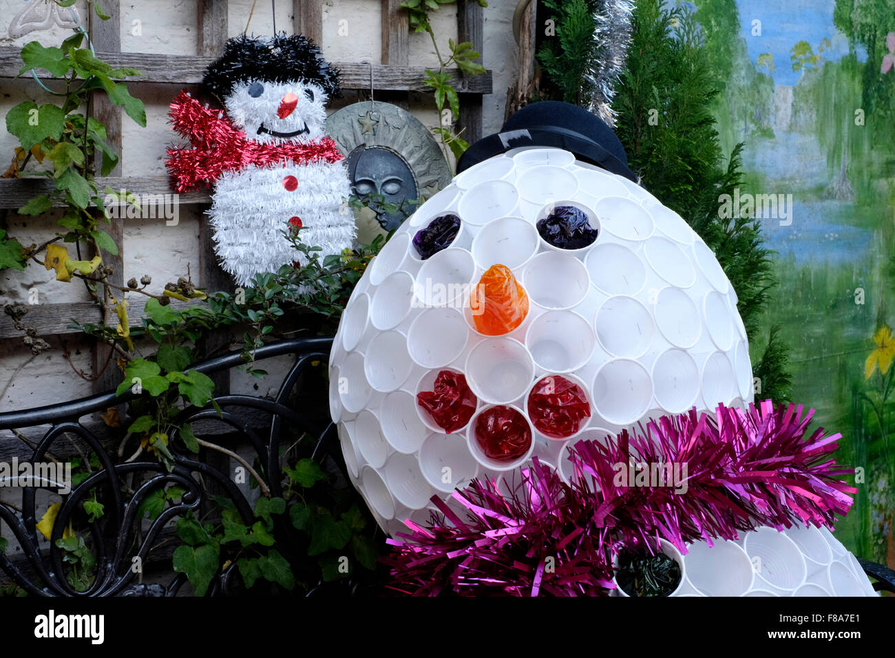 christmas garden snowman decoration made from plastic cups Stock Photo -  Alamy