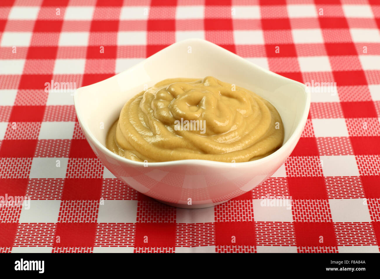 Mustard in bowl Stock Photo Alamy