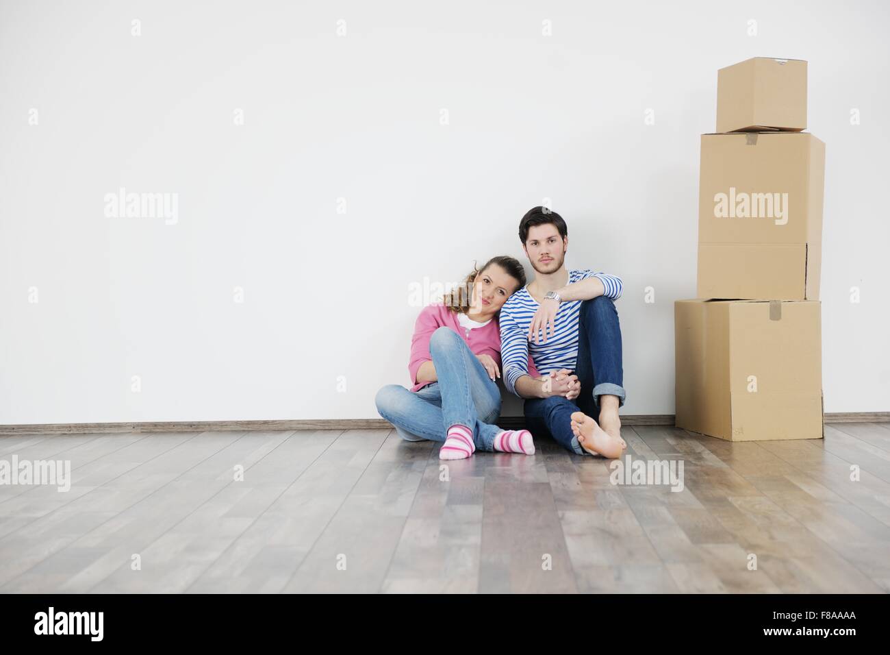 happy Young couple moving in new house Stock Photo - Alamy