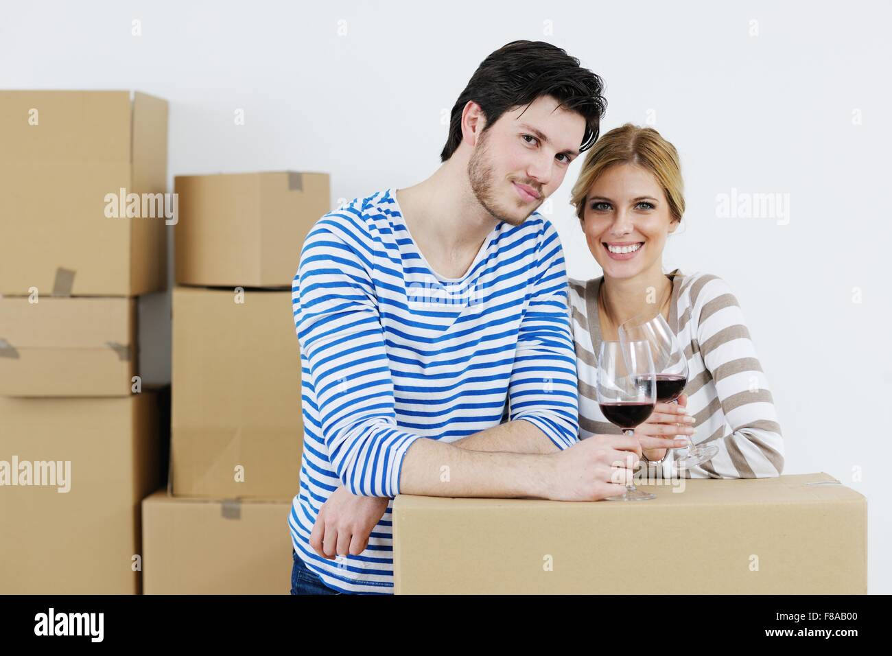 happy Young couple moving in new house Stock Photo - Alamy
