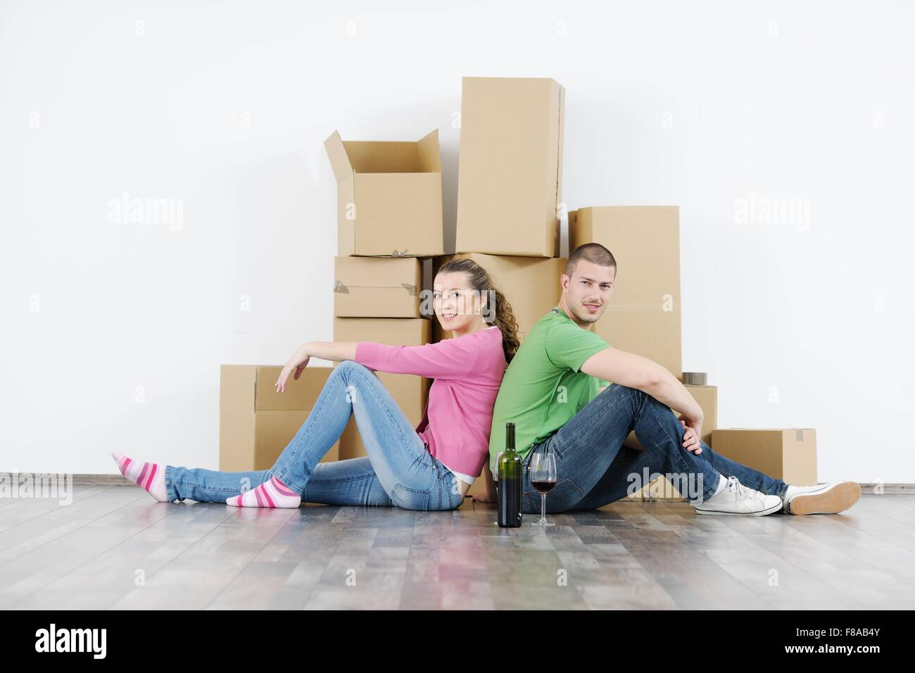 happy Young couple moving in new house Stock Photo - Alamy