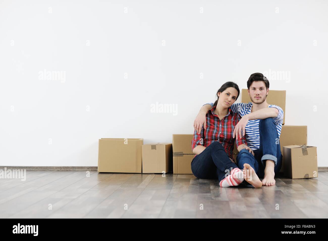 happy Young couple moving in new house Stock Photo - Alamy