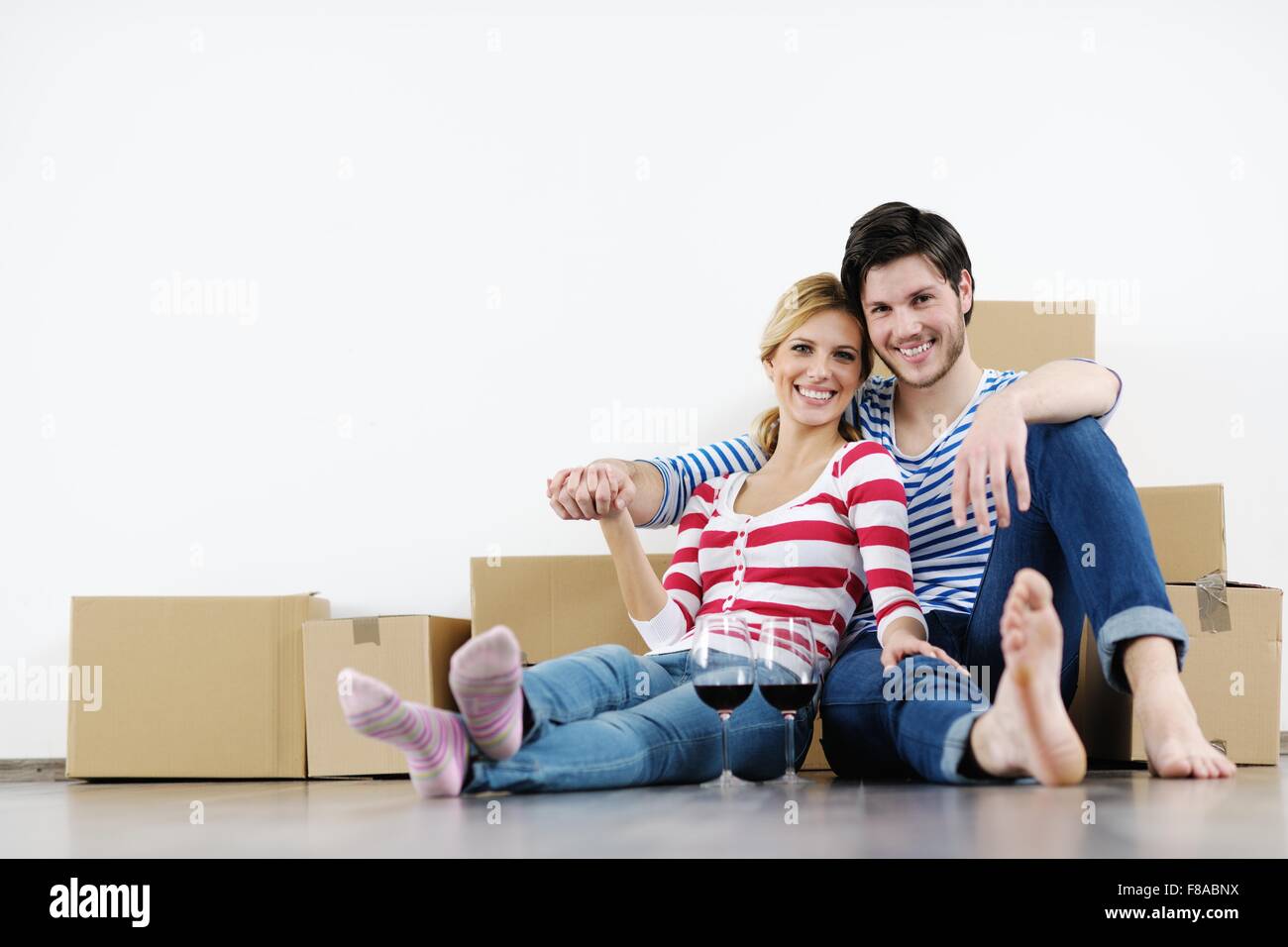 happy Young couple moving in new house Stock Photo - Alamy