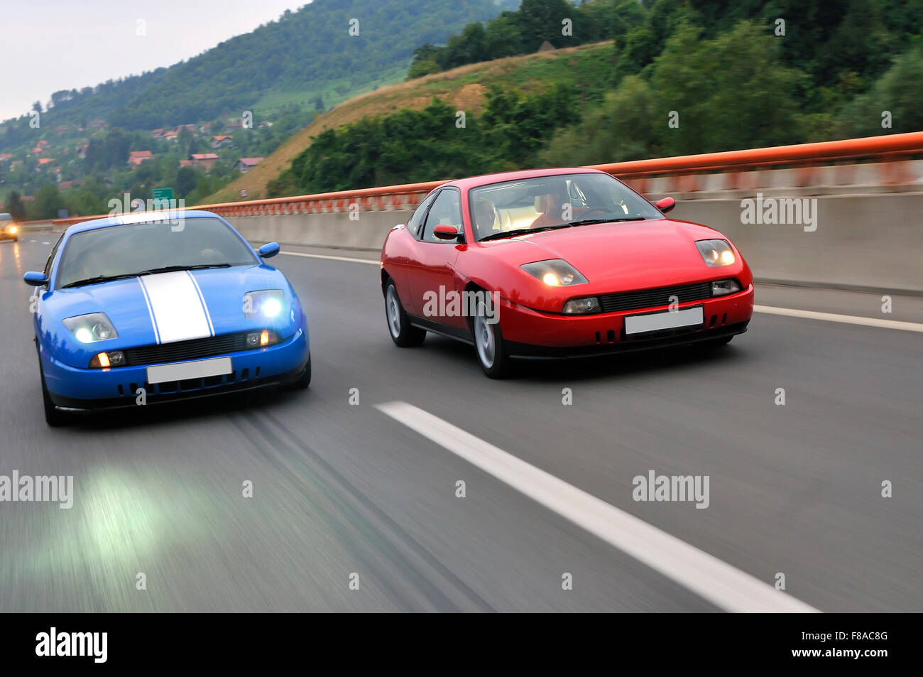 Two hot tuning cars racing Stock Photo - Alamy