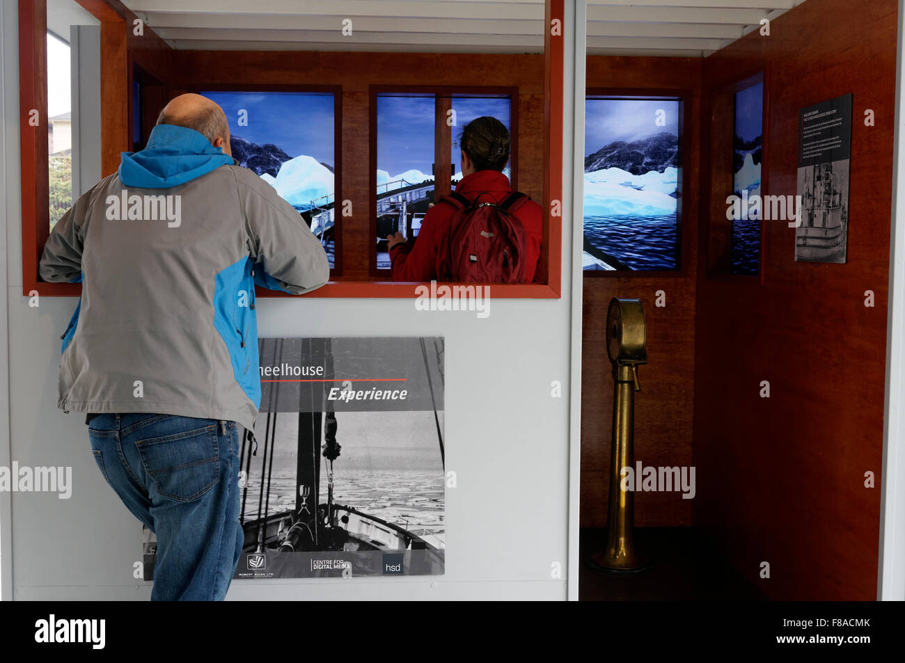 Visitors  RCMP St. Roch  Wheelhouse Experience interactive display, Vancouver Maritime Museum, Vancouver, BC, Canada Stock Photo