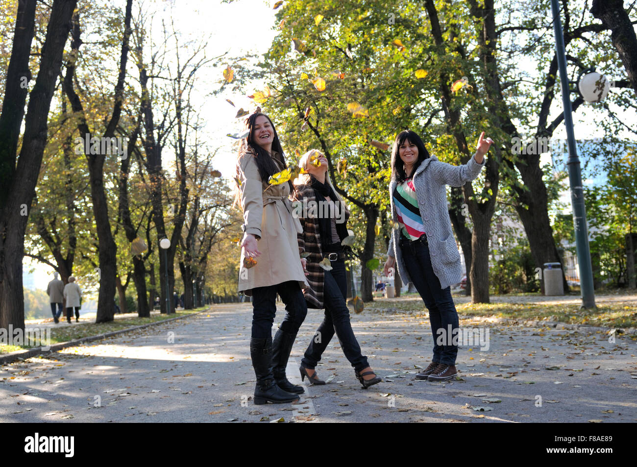 Three young ladies enjoying a day in nature Stock Photo - Alamy