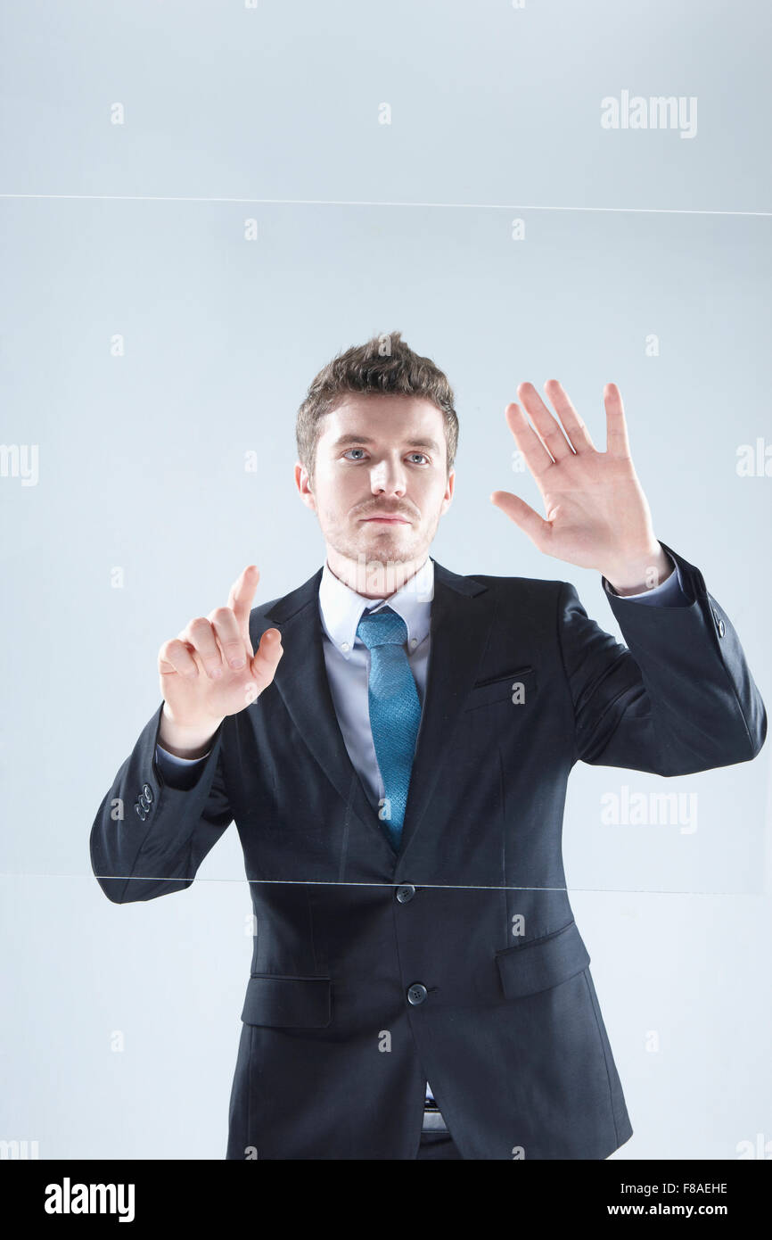 Business man using a touch screen Stock Photo