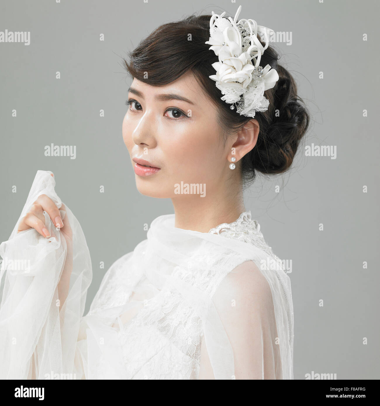 Woman in wedding dress being graceful Stock Photo