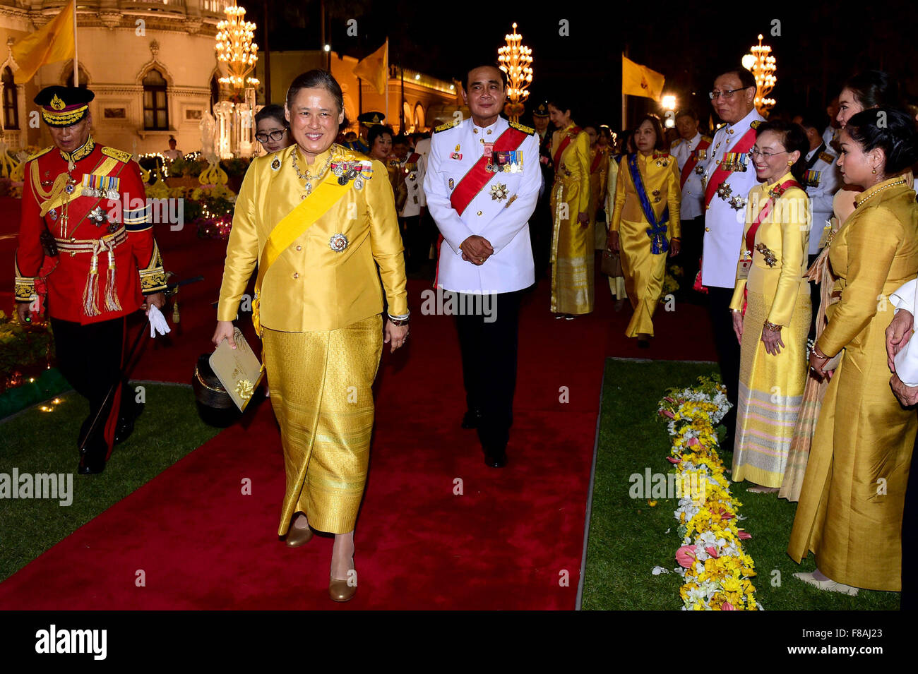 Bangkok, Thailand. 7th Dec, 2015. Thai Princess Maha Chakri Sirindhorn (L, front) arrives for a social function for the 88th birthday of Thai King Bhumibol Adulyadej at the Government House in Bangkok, Thailand, Dec. 7, 2015. Credit:  Pool Photo by Thai Government House/Xinhua/Alamy Live News Stock Photo