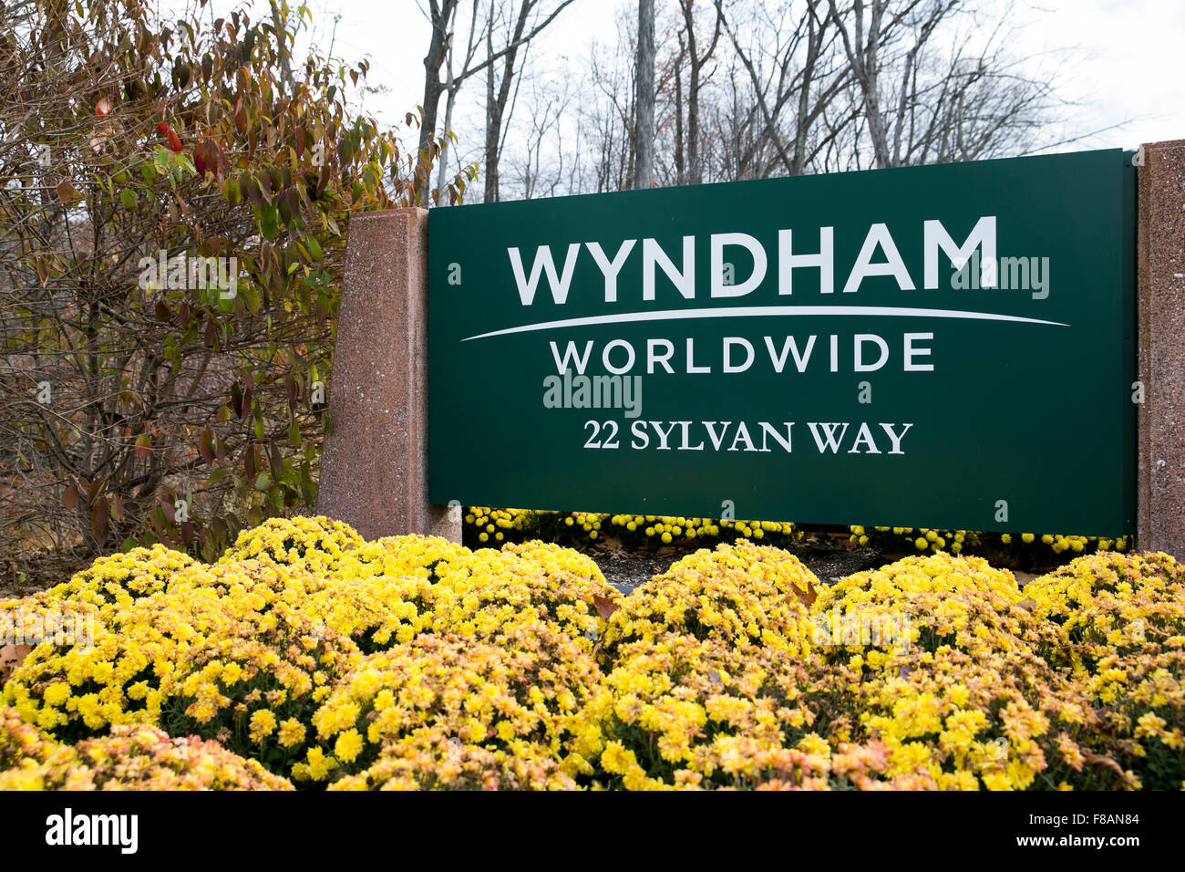 A logo sign outside of the headquarters of the hotel operator Wyndham