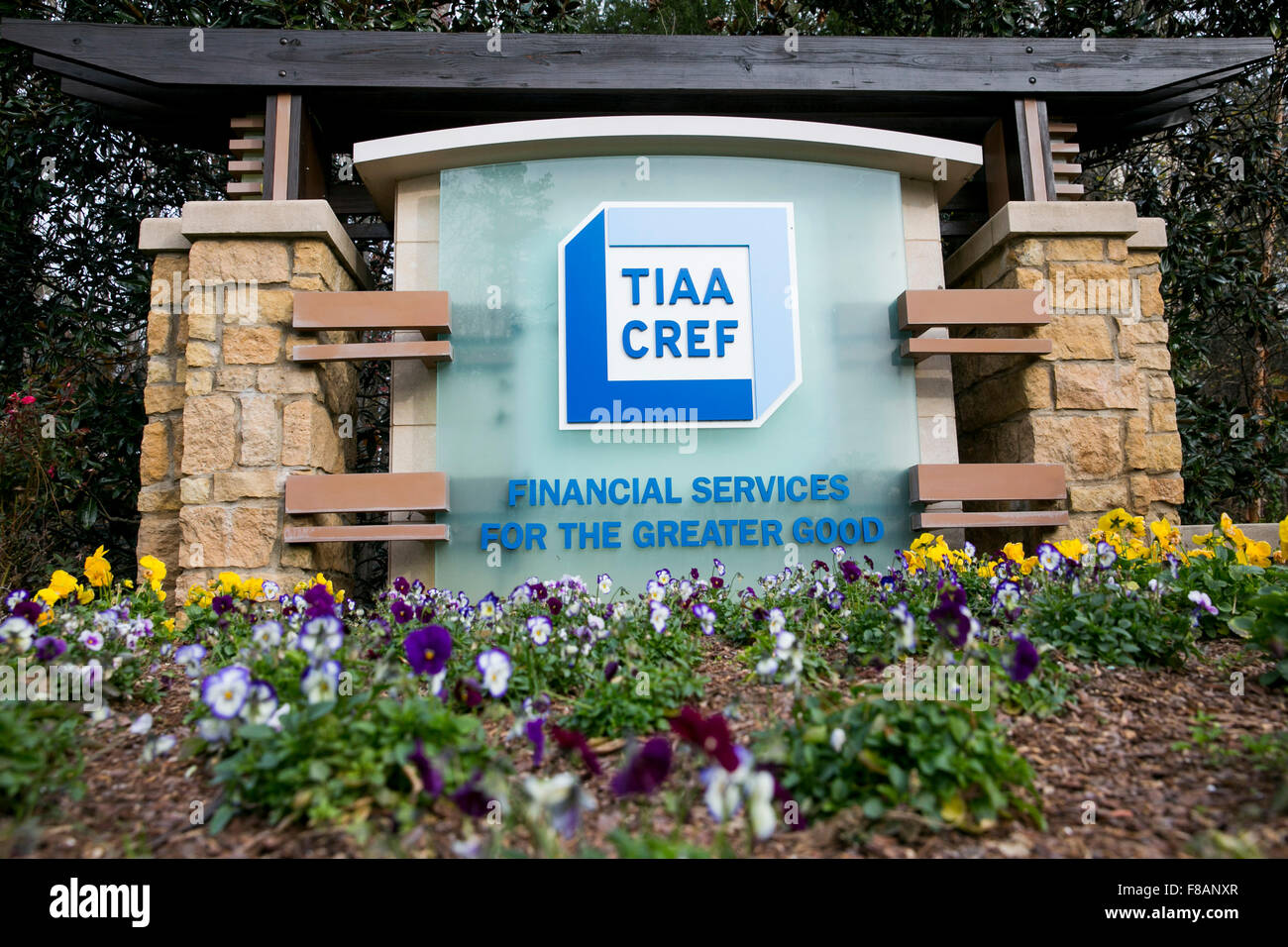 A logo sign outside of a facility occupied by the Teachers Insurance and Annuity Association – College Retirement Equities Fund  Stock Photo