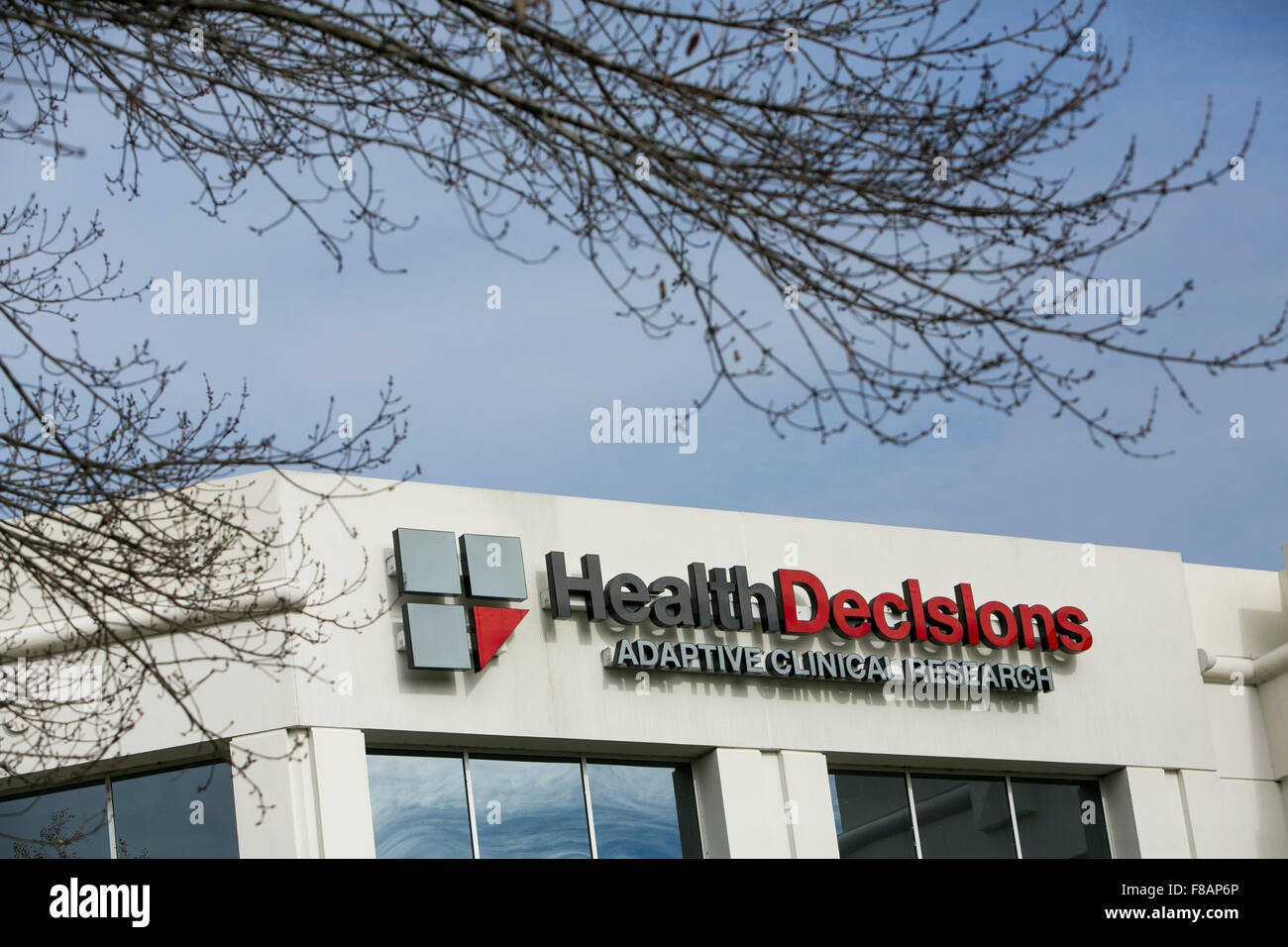 A logo sign outside of a facility occupied by Health Decisions Inc., in Durham, North Carolina on November 29, 2015. Stock Photo