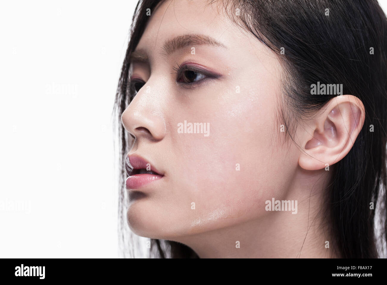 Side view face of young woman Stock Photo