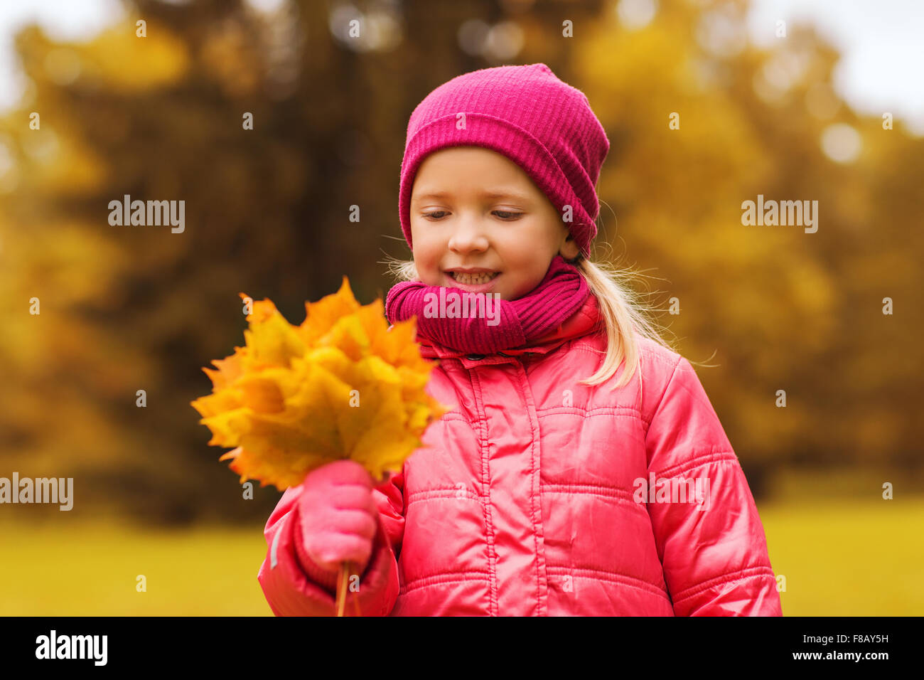 happy beautiful little girl portrait outdoors Stock Photo - Alamy