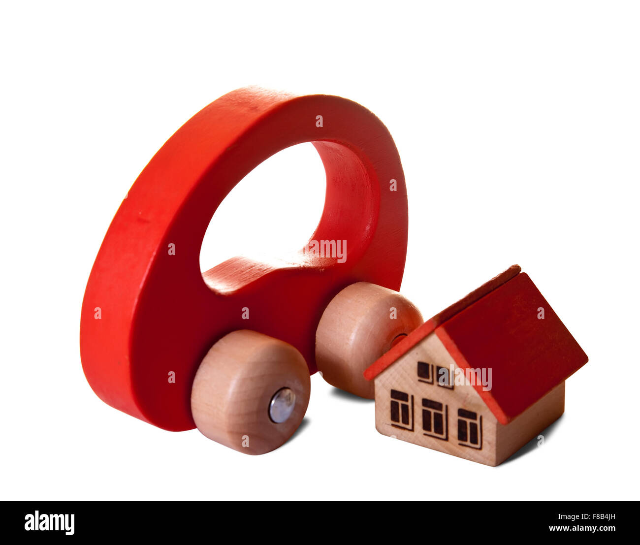 Wooden toy house and car on white background Stock Photo - Alamy