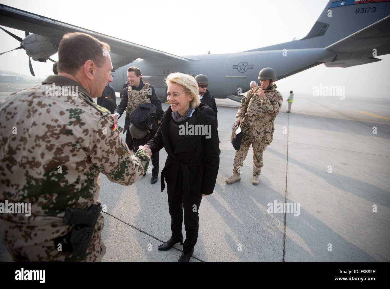 Kabul, Afghanistan. 8th Dec, 2015. German Defence Minister Ursula von der Leyen (CDU) is met by Generalleutnant (lit. lieutenant-general) Frank Leidenberger, after arriving on a US airforce Hercules transport plane at the airport in Kabul, Afghanistan, 8 December 2015. In Kabul, von der Leyen is also meeting with Afghanistan's President Ghani. PHOTO: KAY NIETFELD/DPA/Alamy Live News Stock Photo