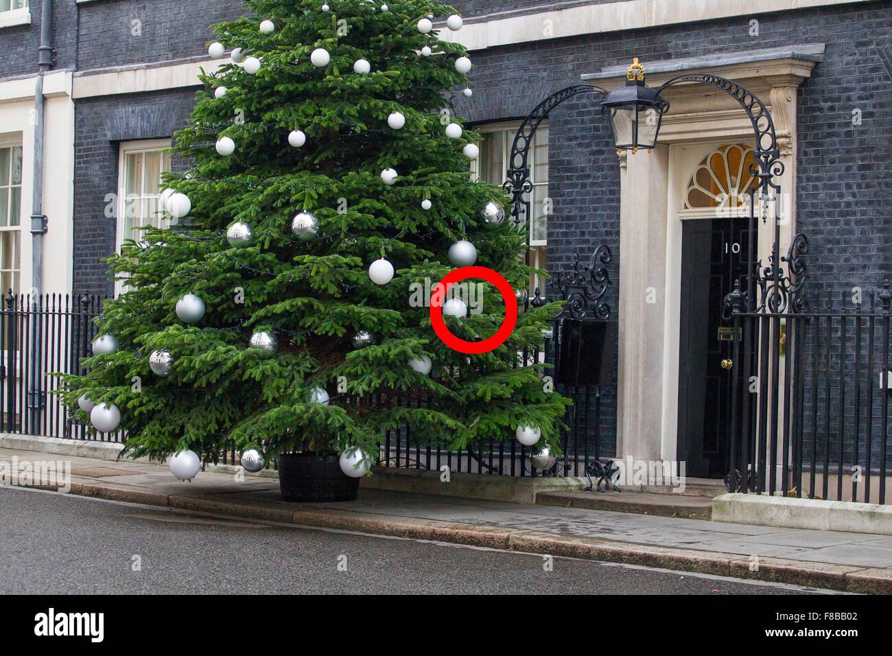 The special Number 10 bauble hanging on the Christmas tree outside number ten Stock Photo