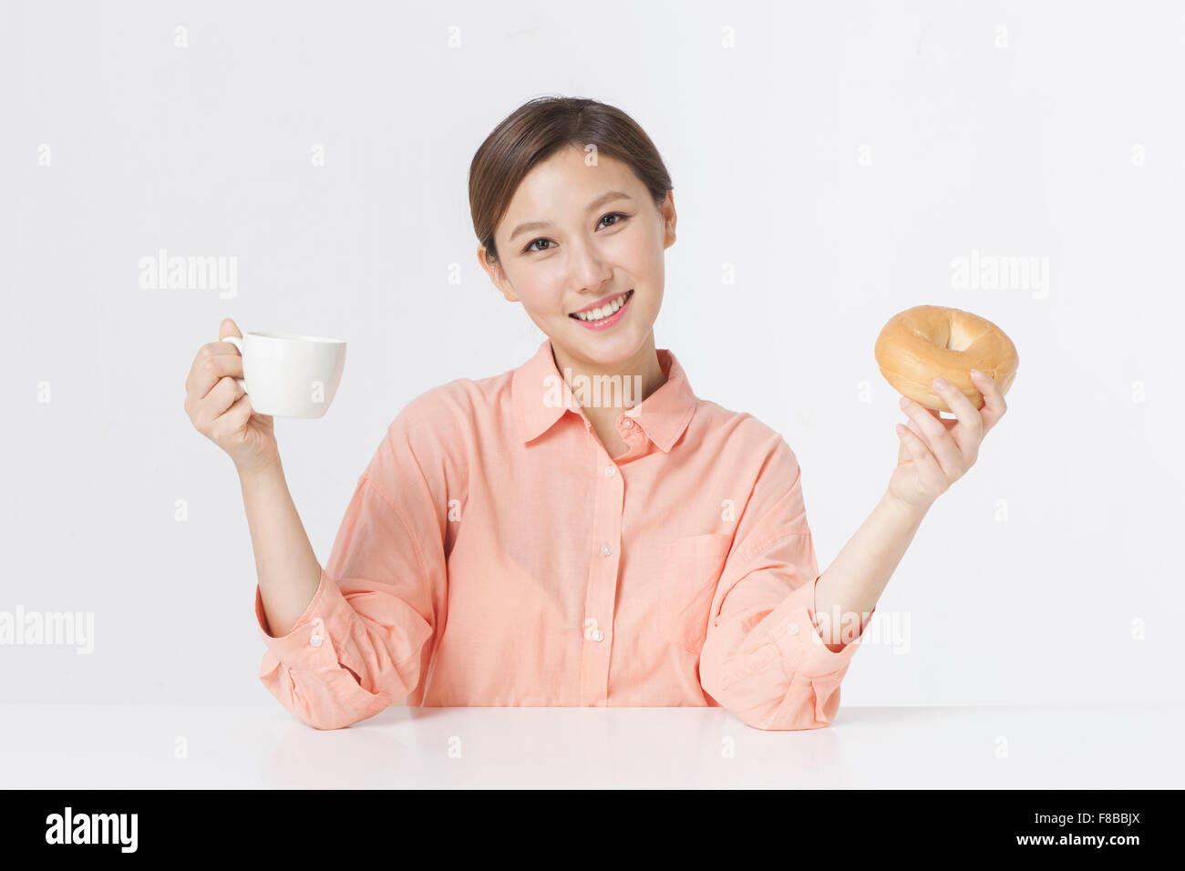 One in an orange shirt and one in hi-res stock photography and images ...