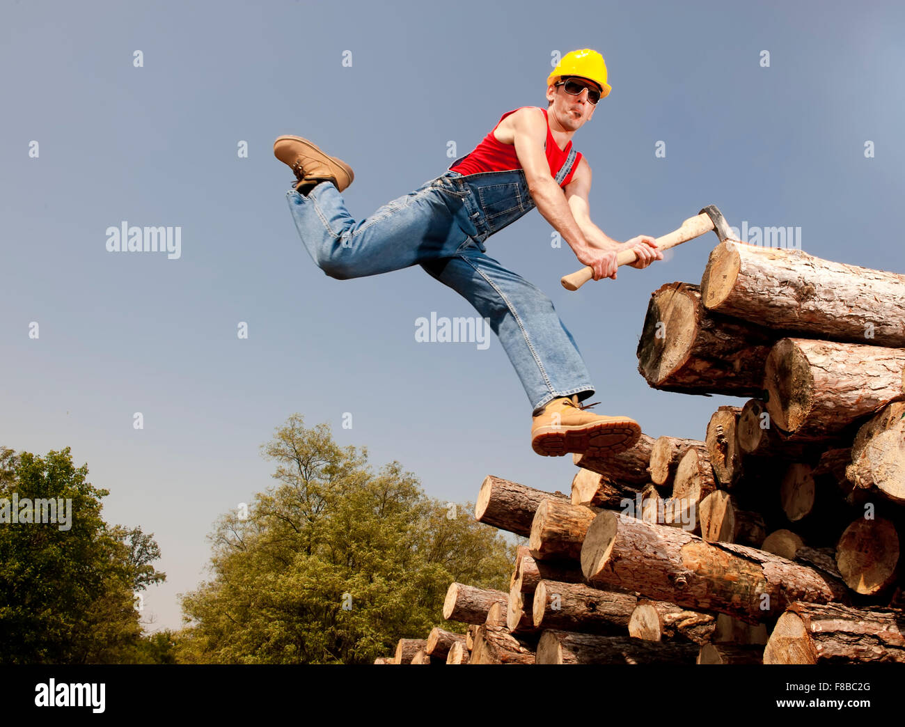 Man cuts log industrial hi-res stock photography and images - Alamy