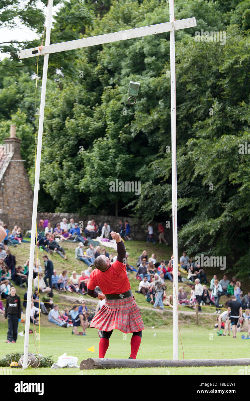 Cupar, Scotland - June 29th, 2013: The 'Weight for Height' event at the Ceres Highland Games in Cupar, Scotland. Stock Photo