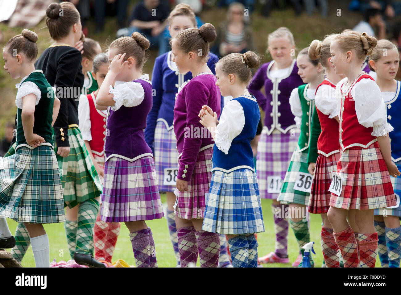 Cupar, Scotland - June 29th, 2013: A group of contestants for the Highland Dancing events at Ceres Highland Games. Stock Photo