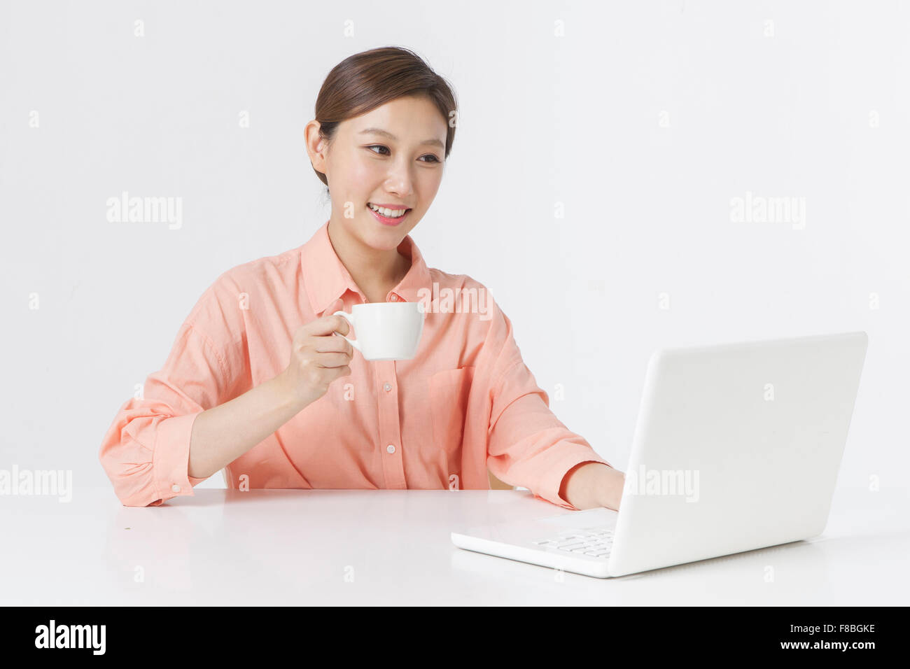 Person in orange shirt hi-res stock photography and images - Alamy