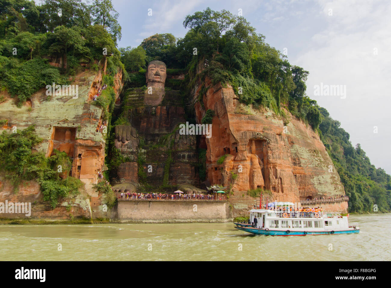 Leshan Giant Buddha and Tourist Boat Sichuan Province China LA008722 Stock Photo