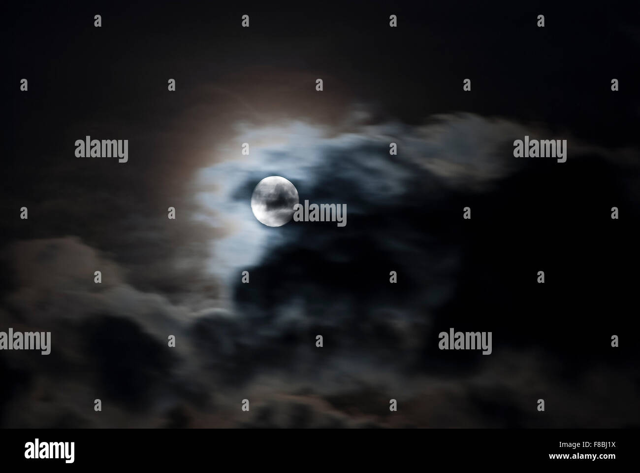 Full moon, cloudy sky, Germany Stock Photo Alamy