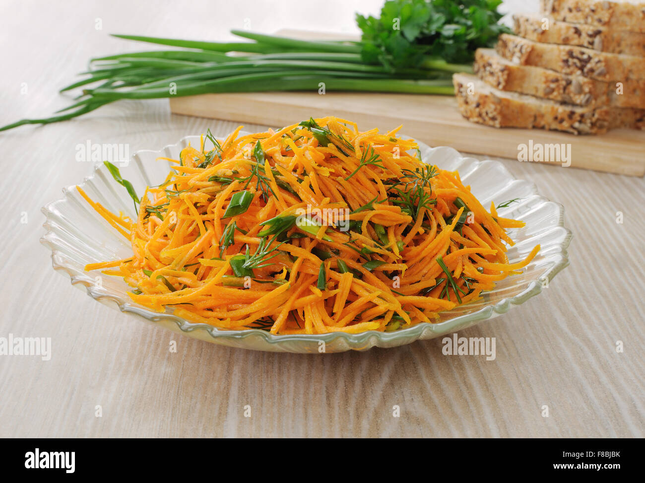 Carrot salad with green onion and dill Stock Photo