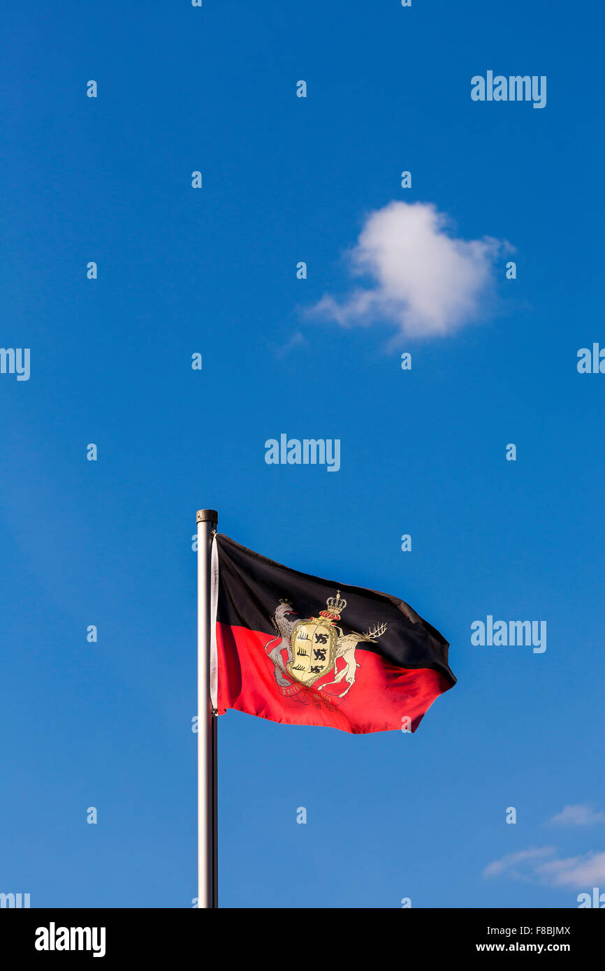 Flag, Kingdom of Württemberg, against blue sky with a small cloud Stock Photo