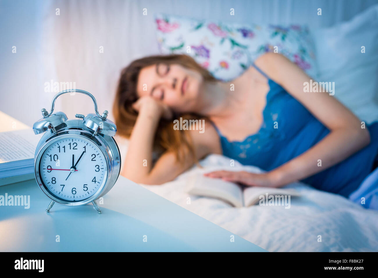 Woman resting bed. Stock Photo