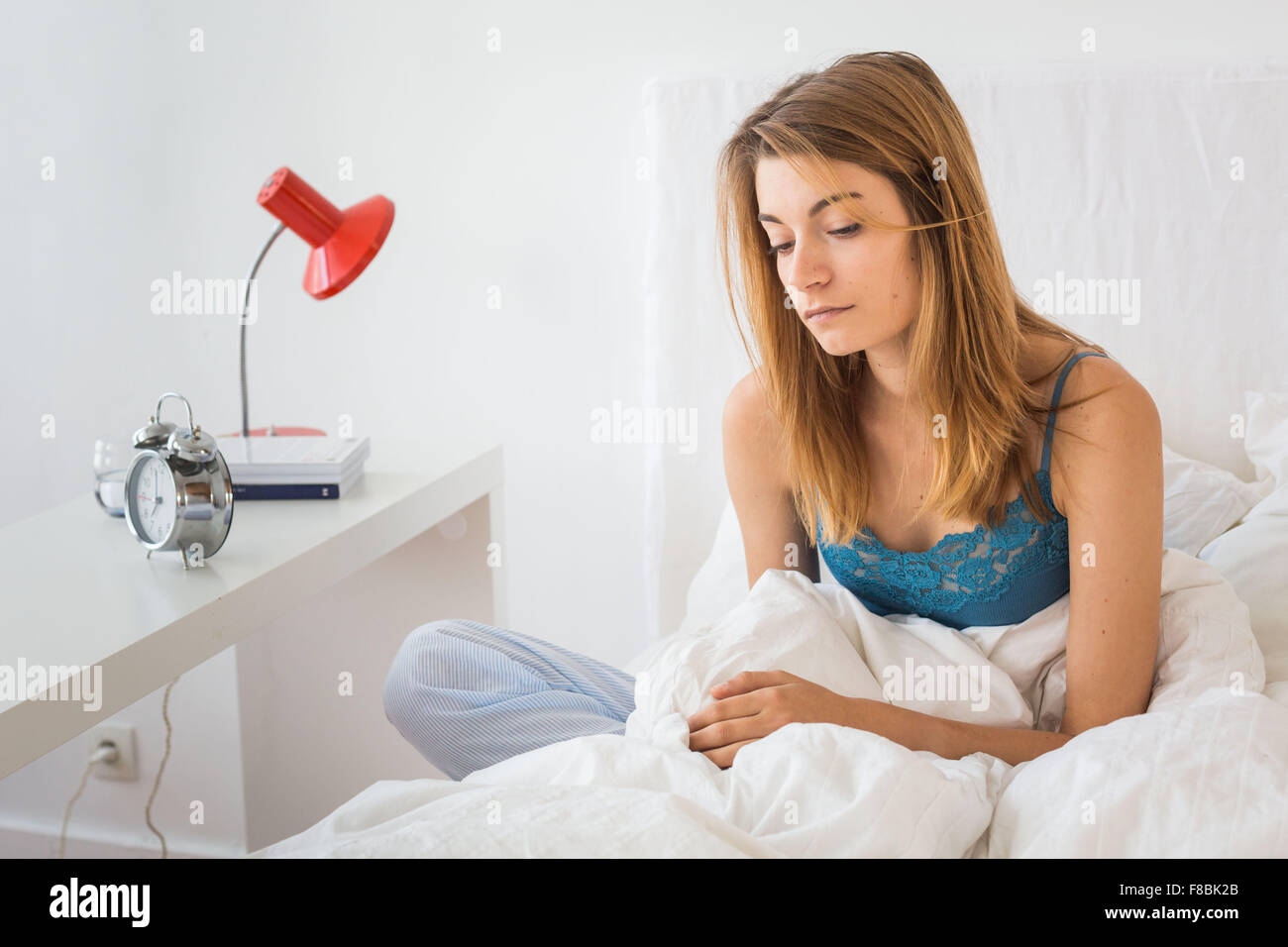 Woman in bed. Stock Photo