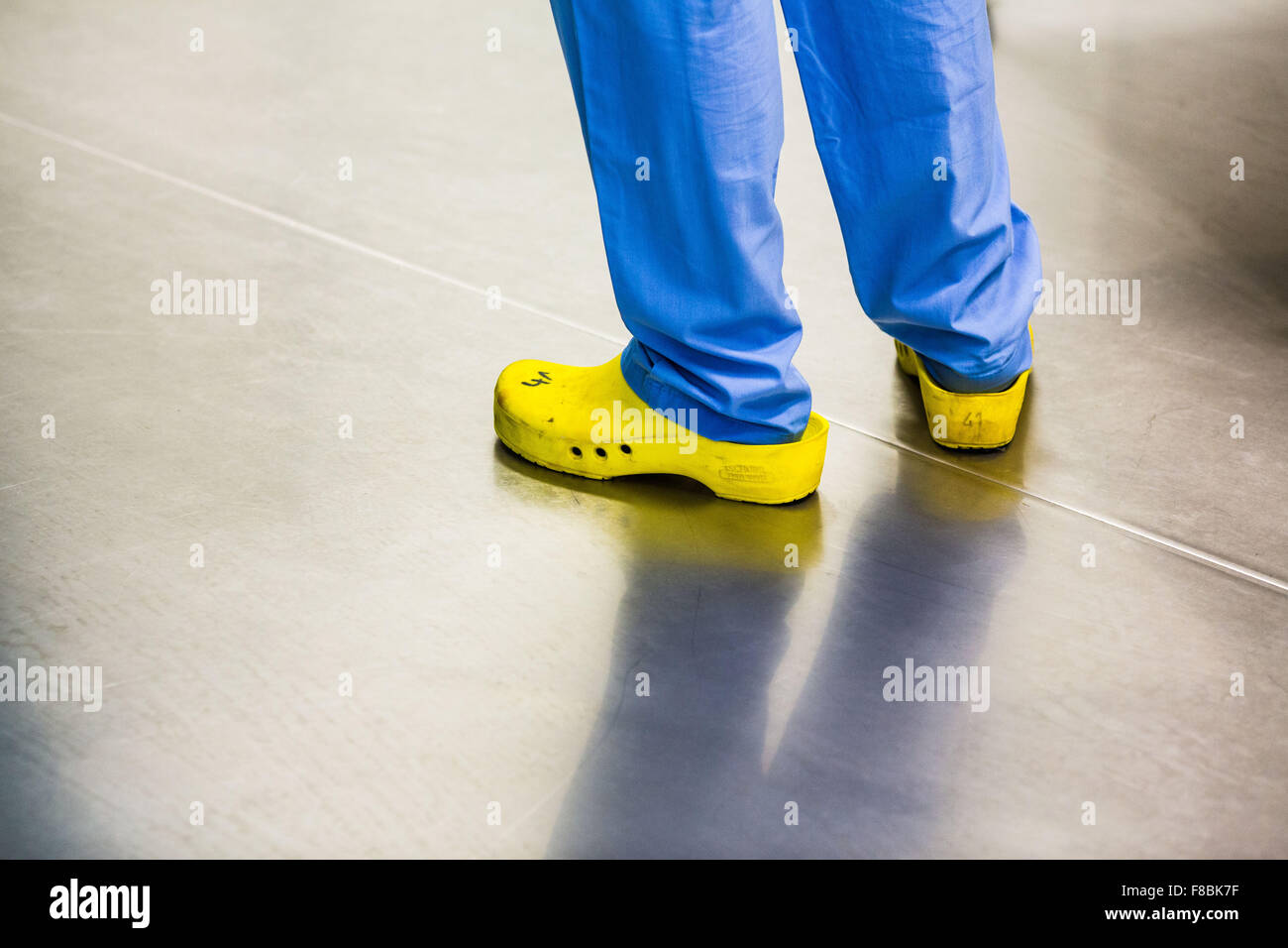 Nurses wearing plastic shoes at hospital. Stock Photo