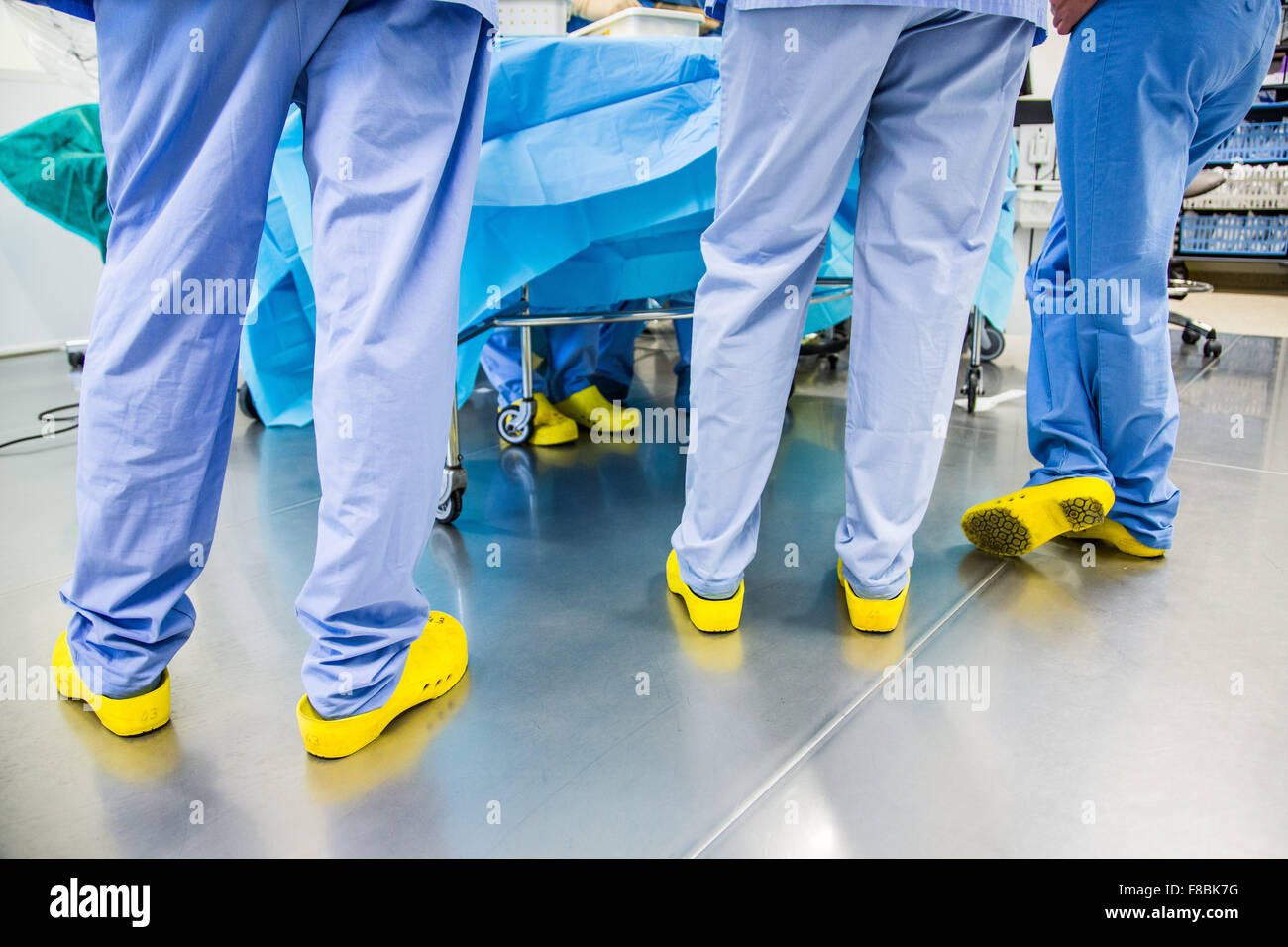 Nurses wearing plastic shoes at hospital. Stock Photo