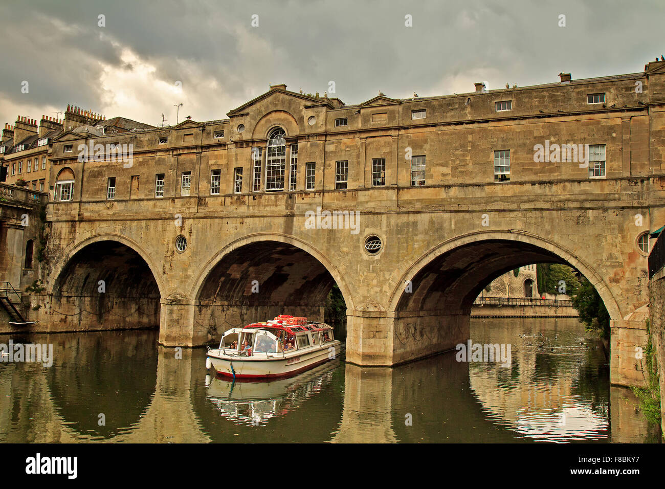 UK Somerset Bath Boat Exiting  Pulteney Bridge Stock Photo