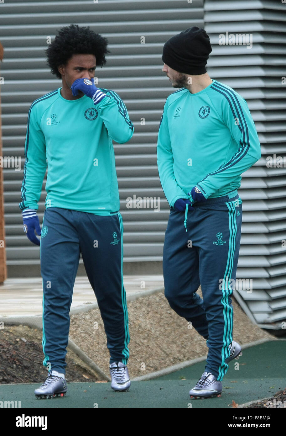 Cobham, Surrey, UK. 8th December, 2015. Willian(L) and Hazard chat as they  walk to the pitch as Chelsea Football Club players train for tomorrow's  vital clash with FC Porto (Portugal) in the