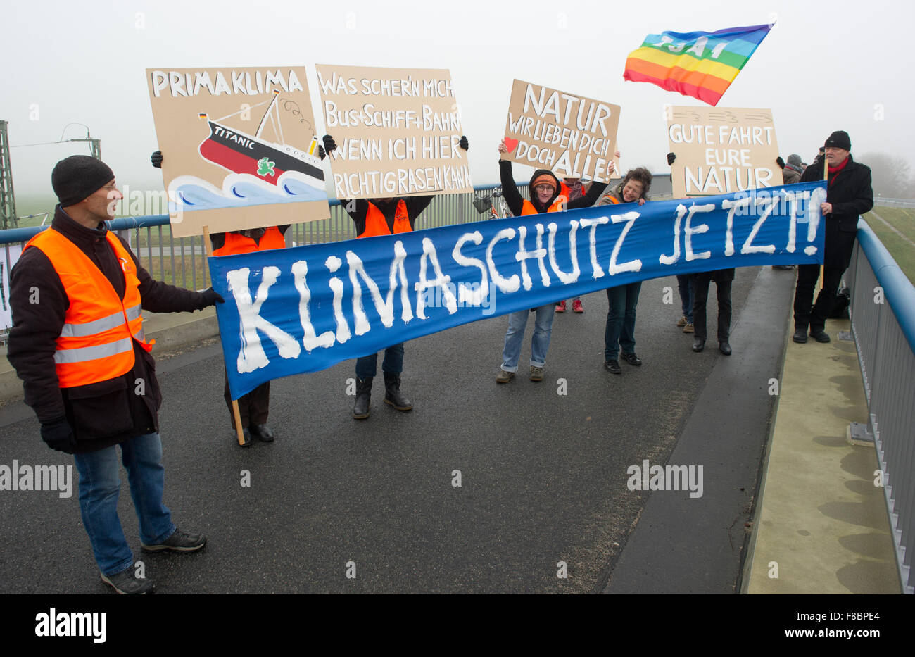 Rambin, Germany. 8th Dec, 2015. Environmental campaigners protest against the opening of a new section of the B96 motorway on the island of Ruegen, near Rambin, Germany, 8 December 2015. PHOTO: STEFAN SAUER/DPA/Alamy Live News Stock Photo