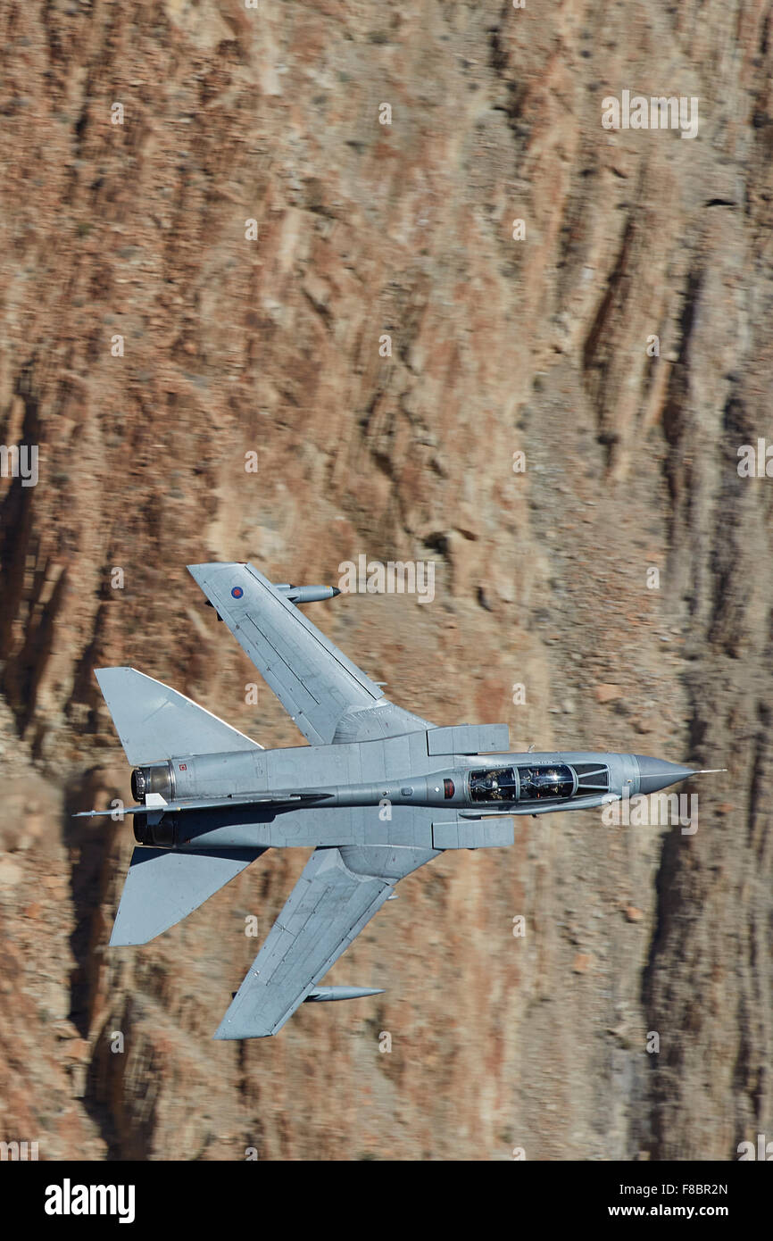 Royal Air Force Tornado GR4 Jet Fighter Flying At Low Altitude Through Rainbow Canyon, California. Stock Photo