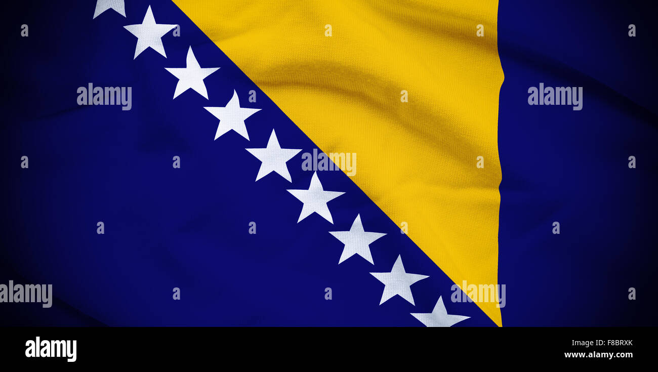 Wavy and rippled national flag of Bosnia and Herzegovina background. Stock Photo