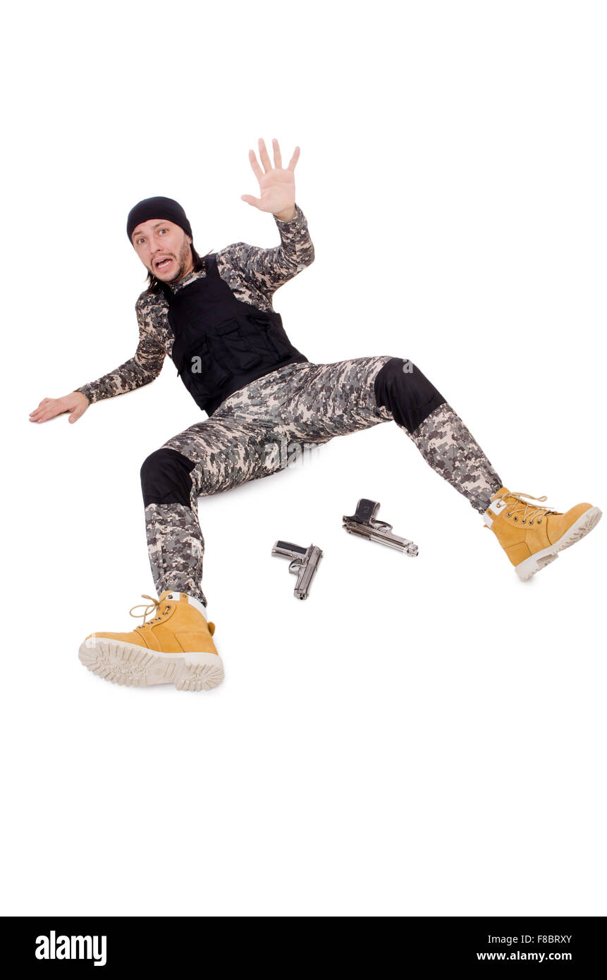 Surrendering man in military uniform holding gun isolated on white ...