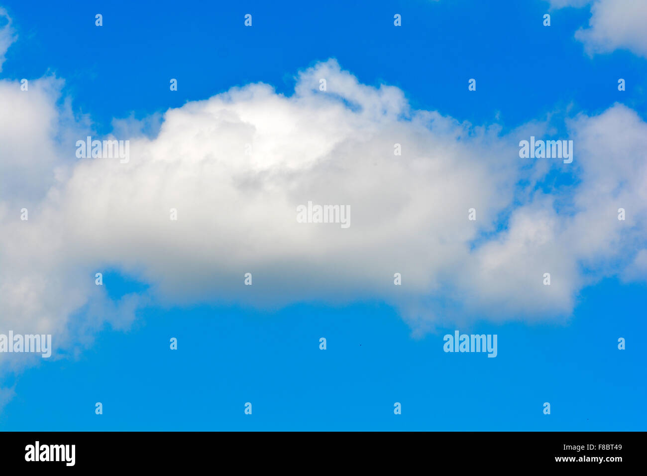 white fluffy clouds in the blue sky Stock Photo - Alamy