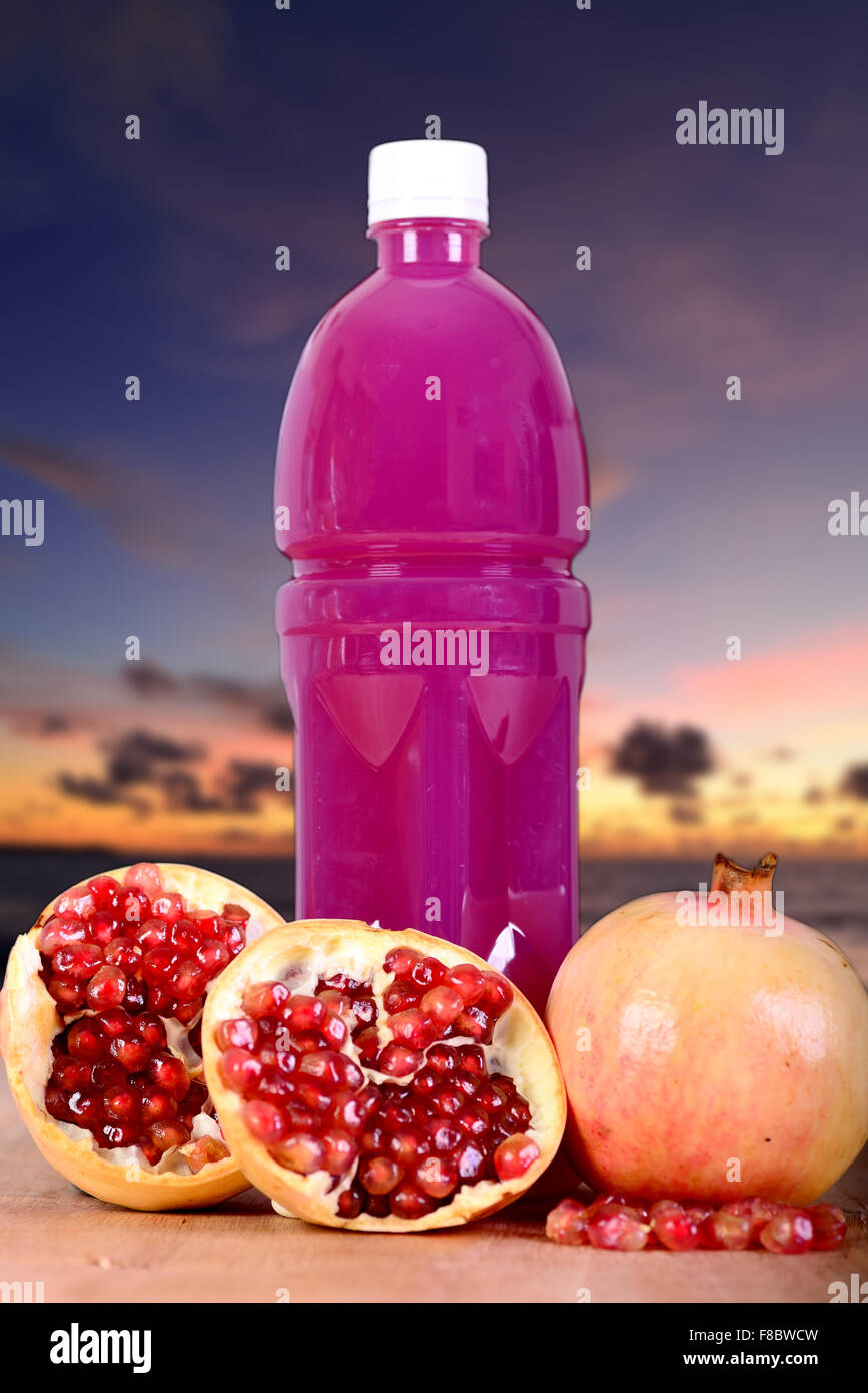 Fresh pomegranate juice with a sky background Stock Photo