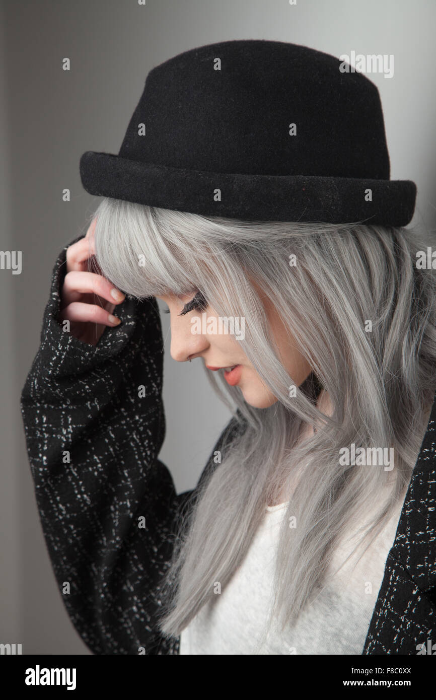 Portrait of an eighteen year old woman with dyed gray hair. Stock Photo