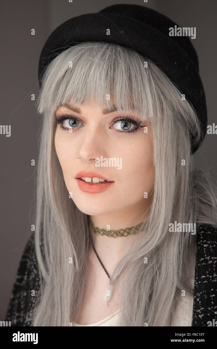 Portrait of an eighteen year old woman with dyed gray hair. Stock Photo