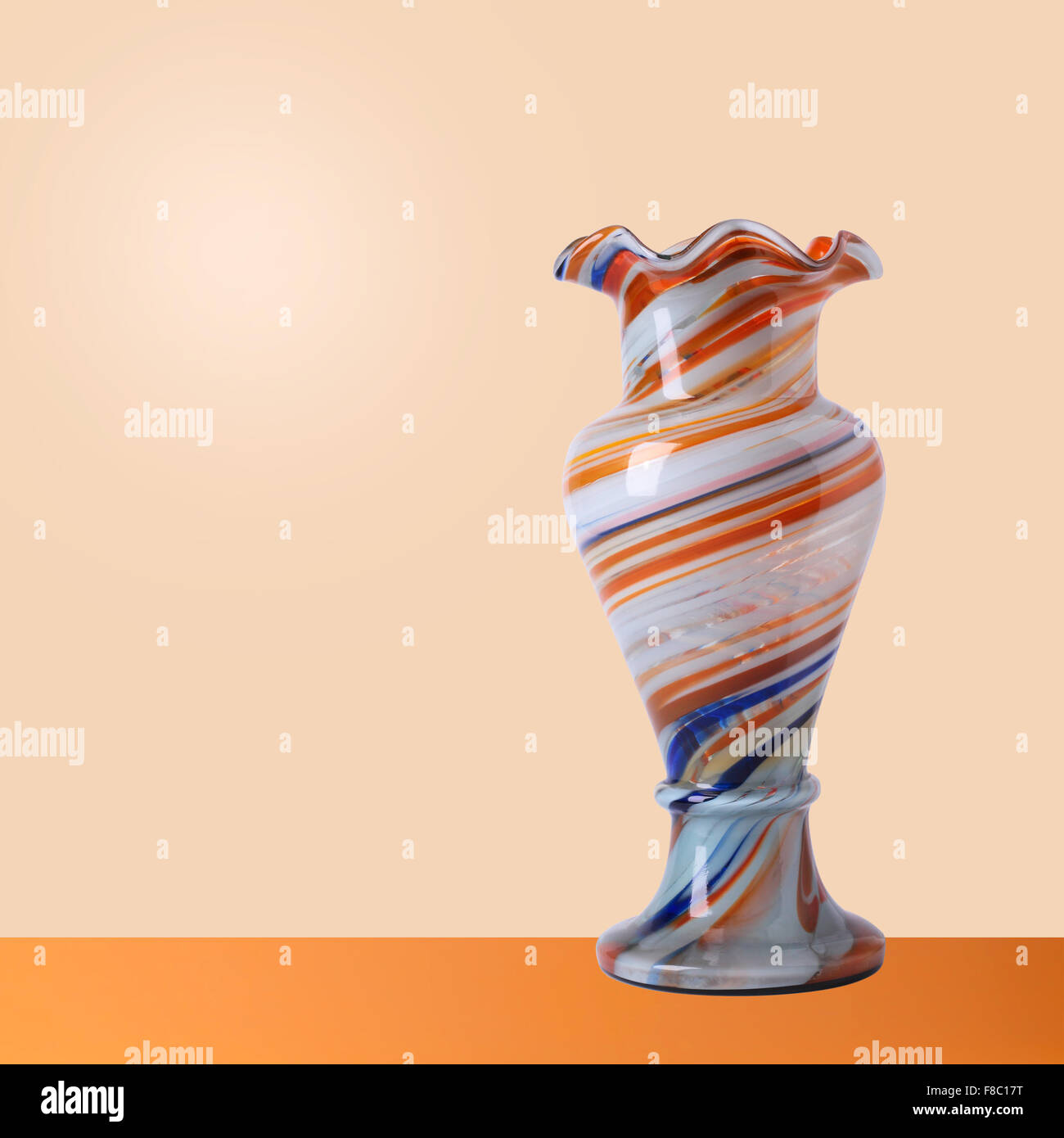 Glass vintage vase on a light orange background Stock Photo Alamy