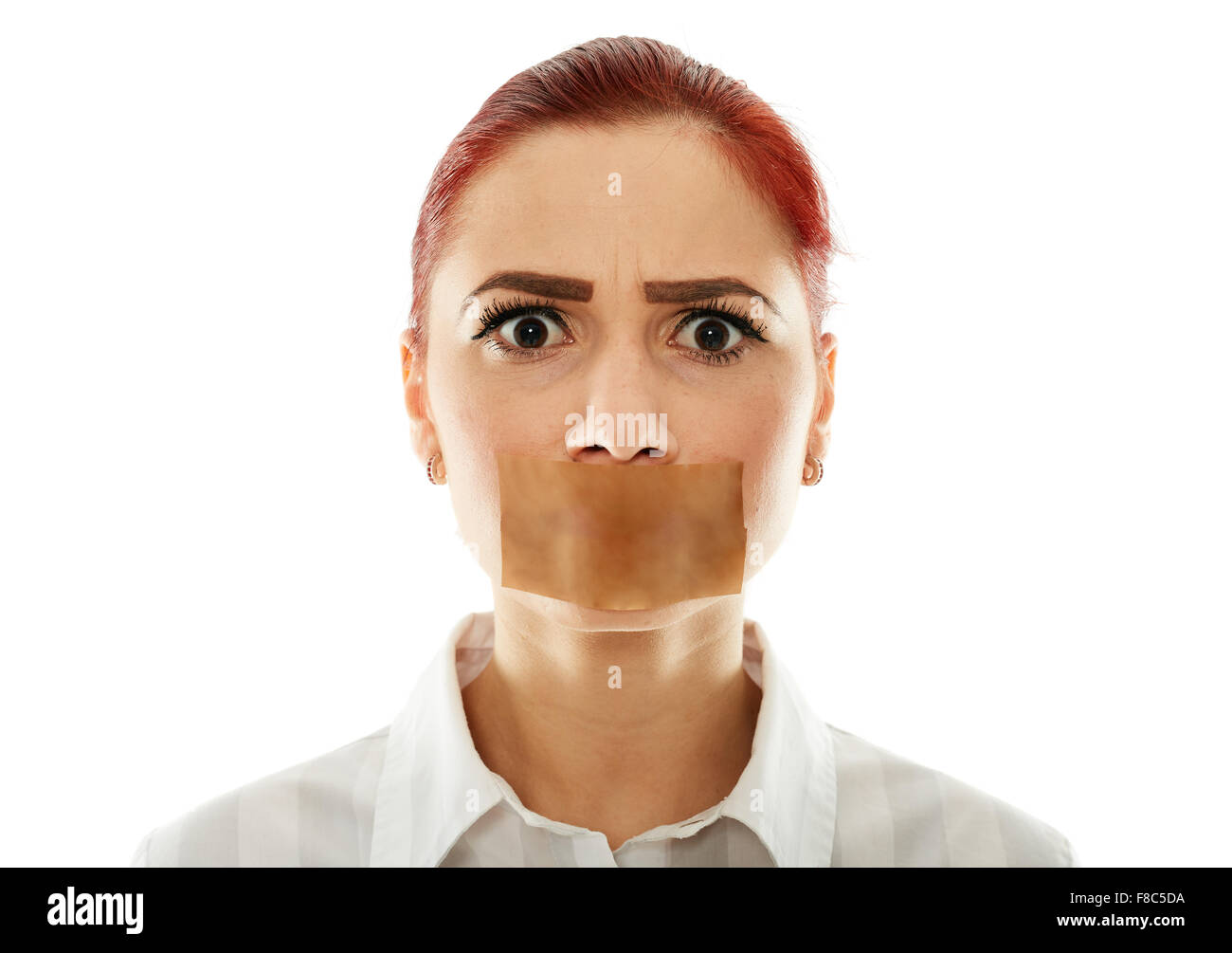 Muted businesswoman with adhesive tape over her mouth, closeup Stock Photo